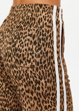 THE UPSIDE women's leopard Panthera Jetset Pant is made from viscose and rayon. The side stripe pants features pockets. Designed for travel and lounge.