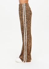 THE UPSIDE women's leopard Panthera Jetset Pant is made from viscose and rayon. The side stripe pants features pockets. Designed for travel and lounge.