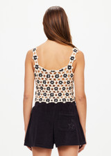 THE UPSIDE women's natural Luminary Lily Crochet Top is made from cotton. The crop top features scoop neck. Designed to wear over our ballet bras or bikini.