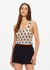 THE UPSIDE women's natural Luminary Lily Crochet Top is made from cotton. The crop top features scoop neck. Designed to wear over our ballet bras or bikini.