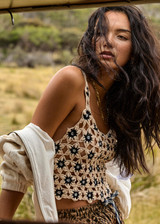 THE UPSIDE women's natural Luminary Lily Crochet Top is made from cotton. The crop top features scoop neck. Designed to wear over our ballet bras or bikini.