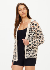 THE UPSIDE women's natural Luminary Malia Crochet shirt is made from cotton. The long sleeve oversized shirt features collar. Designed for travel and holiday.