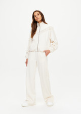 THE UPSIDE women's natural Bow n Arrow Fringe Zip Jacket is made from jacquard. The zip up jacket features elasticated cuffs and hem. Designed for comfort.