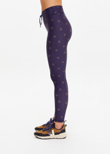 THE UPSIDE women's navy horseshoe print Cheval 28in Midi Pant is made from recycled, super soft and breathable quick-drying fabric and feature a waist drawcord.