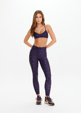 THE UPSIDE women's navy horseshoe print Cheval 28in Midi Pant is made from recycled, super soft and breathable quick-drying fabric and feature a waist drawcord.