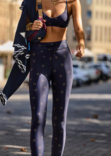 THE UPSIDE women's navy horseshoe print Cheval 28in Midi Pant is made from recycled, super soft and breathable quick-drying fabric and feature a waist drawcord.