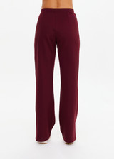 THE UPSIDE women's maroon Ryder Petra Flare Trackpant feature blue side stripes, a split hem, elasticated waist and side pockets.