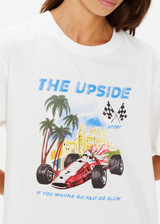 THE UPSIDE women's cream organic cotton Raceway Sammi Tee is designed for an oversized fit with printed raceway graphics on the front.