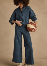 THE UPSIDE women's blue organic cotton Lumiere Dillon Knit Pant is designed for a relaxed fit and features a soft elasticated waist in a geometric star design. Made for lifestyle.