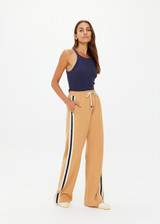 THE UPSIDE women's yellow Le Sport Marine Wide Leg Pant is a high-rise fit with an elasticated waistband and drawcord, featuring side seam pockets. Perfect for everyday.