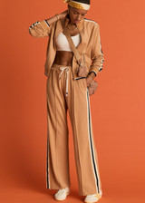 THE UPSIDE women's yellow Le Sport Marine Wide Leg Pant is a high-rise fit with an elasticated waistband and drawcord, featuring side seam pockets. Perfect for everyday.