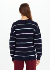 THE UPSIDE women's stripe organic cotton Sebastian Crew Knit Sweater is designed for a relaxed fit and features a knitted rib neckline and cuffs. Made for lifestyle.