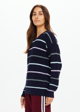 THE UPSIDE women's stripe organic cotton Sebastian Crew Knit Sweater is designed for a relaxed fit and features a knitted rib neckline and cuffs. Made for lifestyle.