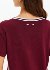THE UPSIDE women's merlot Sienna V Neck Tee is a retro style slim fit track tee in a lightweight knit and features a deep V neckline. Made for everyday.