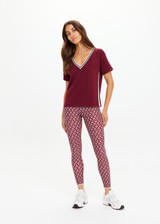 THE UPSIDE women's merlot Sienna V Neck Tee is a retro style slim fit track tee in a lightweight knit and features a deep V neckline. Made for everyday.