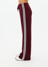 THE UPSIDE women's merlot Vitesse Marine Wide Leg Pant is a high rise fit and features a elasticated waistband, drawcord and side seam pockets in slinky fabrication. Made for lifestyle.