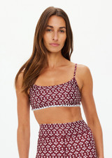 THE UPSIDE women's floral Firefly Hutton Scoop Bra is mid coverage with scoop front, adjustable straps, removable bust cups and shelf bra. Made for pilates.