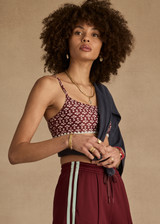 THE UPSIDE women's floral Firefly Hutton Scoop Bra is mid coverage with scoop front, adjustable straps, removable bust cups and shelf bra. Made for pilates.