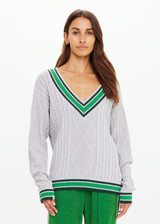 THE UPSIDE women's grey marle organic cotton Josette V Neck Knit Sweater is a regular fit and features cable detailing through front and a green striped neckline. Made for lifestyle.