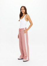 THE UPSIDE women's pink Galaxia Loretta Pant is designed for a mid to low rise straight leg fit and features elasticated waistband, drawcord and side seam pockets. Made for lifestyle.