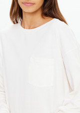 THE UPSIDE women's cream recycled cotton Soho Cara Long Sleeve Top is designed for a relaxed fit and features a ribbed neck and cuffs and a patch pocket at front. Made for everyday leisure.