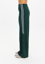 THE UPSIDE women's green Cobra Zephyr Wide Leg Pant comes in a soft fabrication with an elasticated waistband and welt pockets. Made for everyday leisure.
