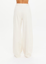 THE UPSIDE women's cream pinstripe Orion Mira Wide Leg Pant is a true-to-size fit and features a flat waistband with belt loops and side pockets. The perfect wardrobe essential.