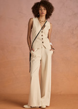 THE UPSIDE women's cream pinstripe Orion Mira Wide Leg Pant is a true-to-size fit and features a flat waistband with belt loops and side pockets. The perfect wardrobe essential.