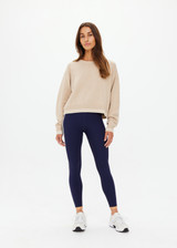 THE UPSIDE women's sand wool cotton blend Xanthe Crew Neck Sweater is designed for a relaxed boxy fit and features contrast cream stripes. Perfect for everyday.
