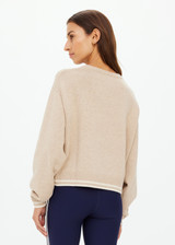 THE UPSIDE women's sand wool cotton blend Xanthe Crew Neck Sweater is designed for a relaxed boxy fit and features contrast cream stripes. Perfect for everyday.
