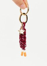 THE UPSIDE women's burgundy Limitless Keyring charm with gold metal star and macrame paracord in deep red with rubber dipped ends.