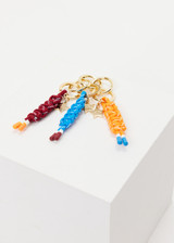 THE UPSIDE women's blue Limitless Keyring charm with gold metal star and macrame paracord in bright blue with rubber dipped ends.