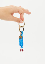 THE UPSIDE women's blue Limitless Keyring charm with gold metal star and macrame paracord in bright blue with rubber dipped ends.