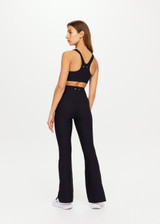 THE UPSIDE women's black Peached Florence Flare is a high-rise full length flare pant with V waistband and a printed arrow logo on back waistband.