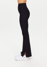 THE UPSIDE women's black Peached Florence Flare is a high-rise full length flare pant with V waistband and a printed arrow logo on back waistband.
