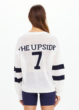 THE UPSIDE women's creme organic cotton Fenway Sebastian Knit Crew is designed for a relaxed fit and features ribbed neckline and cuffs with The Upside 7 logo on back.