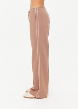 THE UPSIDE women's mocha Jetset Pant is designed for a regular fit and features an elasticated waist with a drawcord and front and back packets. The perfect everyday pant.