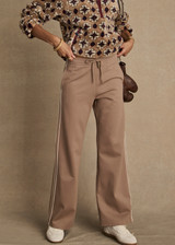 THE UPSIDE women's mocha Jetset Pant is designed for a regular fit and features an elasticated waist with a drawcord and front and back packets. The perfect everyday pant.