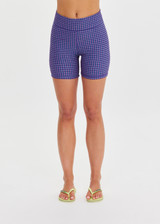THE UPSIDE women's purple check Aliki 5inch Spin Short offers a firm, supportive fit with mid-rise in a recycled textured fabric. Made for yoga and pilates.