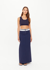 THE UPSIDE women’s Stripe Astra Solange Knit Crop Top offers a soft, comfortable fit with a navy-ribbed scoop neckline and elastic underbust. Perfect for travel or daily wear.