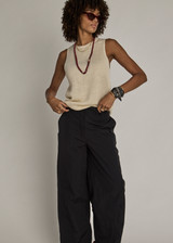 THE UPSIDE women's natural Knitted Tara Tank is made with lightweight linen yarn designed for a relaxed fit. This sleeveless leisure tank features an embroidered horseshoe front logo.