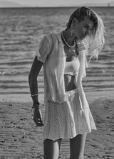 THE UPSIDE women's cream Agni Amayah Knit Shirt is designed for a relaxed fit and features a chevron knit design with pearlised shell buttons. The perfect vacation piece.