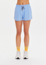 THE UPSIDE women’s blue recycled Era Short is designed to be mid rise, featuring a striped elastic drawcord and inner mesh brief in white. Made for running.
