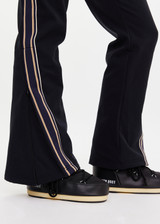 THE UPSIDE women's black Hakuba Petra Zip Flare is a true-to-size fit and offers high water repellency, high breathability and bonded fleece underside for extra warmth. Designed for Après-ski and winter wear.