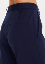 THE UPSIDE women’s navy Mira Wide Leg Pant is high-waisted made from quick-dry fabric, with a structured waistband and fly zip closure. Perfect for everyday.