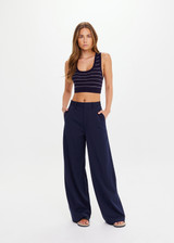 THE UPSIDE women’s navy Mira Wide Leg Pant is high-waisted made from quick-dry fabric, with a structured waistband and fly zip closure. Perfect for everyday.