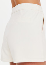 THE UPSIDE women’s cream cotton Penny Tilly Short is a low-rise style with a structured waistband and branded tortoiseshell button closure. Made for everyday wear.