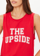 THE UPSIDE women's red organic cotton Jeet Tank Top has a relaxed fit with folded armhole detail and cream varsity logo at chest. Made for everyday wear.