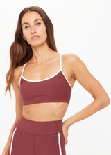 THE UPSIDE women's red recycled peached Samara Bowie Bra offers a soft & supportive fit and features a scooped front neckline with crossback and removable cups. Made for yoga & pilates.