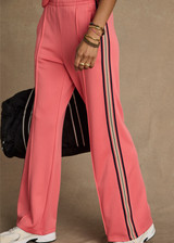 THE UPSIDE women's pink Voila Marnie Wide Leg Pant is a true-to-size fit in a soft suiting fabrication and features an elasticated waistband and pockets. The perfect travel or everyday piece.